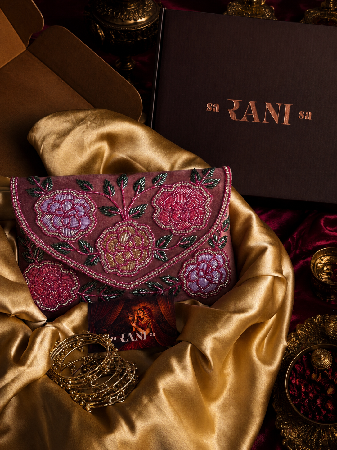 hand embroidered clutch, floral clutch bag, botanical clutch, beaded clutch bag, embroidered handbag, Indian clutch bag, Indian accessories Dubai, Indian jewellery UAE, ghungroo bangles, charm bangles, gold bangles for women, Indian festive accessories, statement accessories, South Asian accessories, Indian gifts for women, Saranisa Dubai